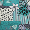 Black, Teal and White Abstract Flowers Printed Jersey Stretch Fabric - Rex Fabrics