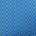 White Circles on Blue Background Printed Cotton - Rex Fabrics