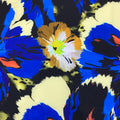 Blue Orange and Ivory Flowers on a Black Background Neoprene Printed Fabric - Rex Fabrics