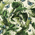 Ivory Background with Green Leaves and Blue Butterflies Printed Fabric - Rex Fabrics