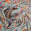 Gray Background with Orange, Blue and Red Leaves Printed Fabric - Rex Fabrics