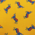 Mustard Background with Blue and Red Figurines Printed Fabric - Rex Fabrics