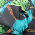 Brown Background with Green and Aqua Monstera Leaves Multicolored Floral Printed Polyester - Rex Fabrics